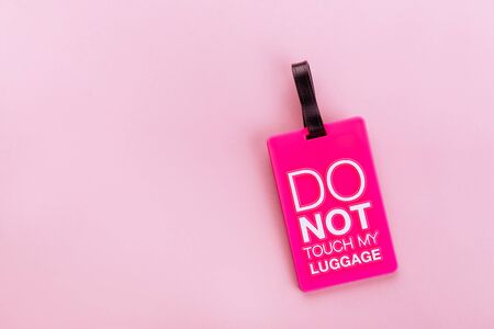 cardboard price tags, sale tag, gift tag, address label, luggage label on pink background. Mock up, copy space for text, top viewの写真素材