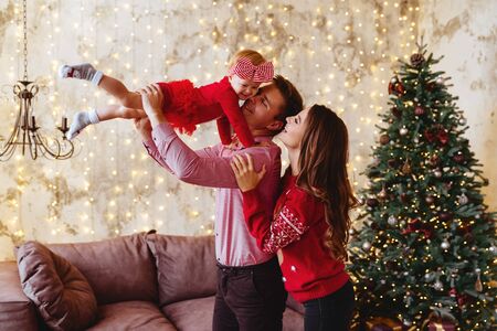 Christmas photo of a happy familyの写真素材