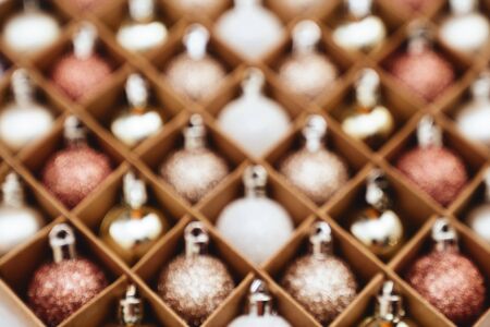 Blurred Golden Christmas baubles decoration in boxの写真素材