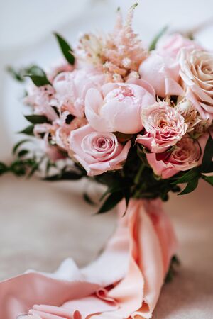fresh bright blooming peonies flowers with dew drops on petalsの写真素材