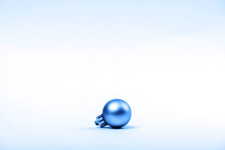Christmas golden baubles Isolated on white backgroundの写真素材