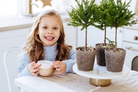Barista making a cappuccino with a classic Italian coffee machineの写真素材