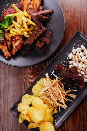 a large plate with a wide selection of snacks for beerの写真素材