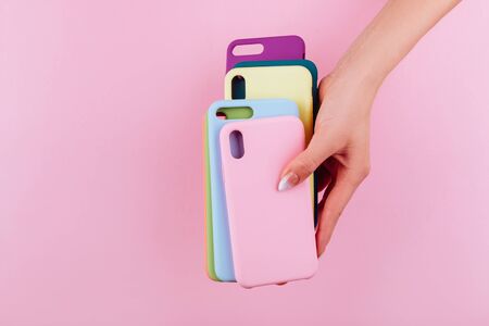 Up to date technology.Top view of diverse personal accessory laying on the pink backgroundの写真素材