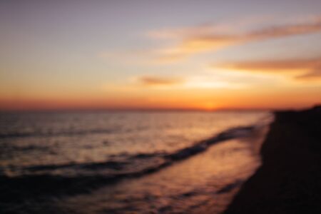 Blur sunset beach abstract background.