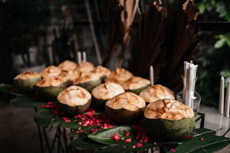 The young coconut is tasty for drinking juice and nice meat to eat.の写真素材