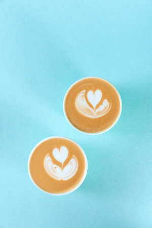 Blue cup of latte art with copy space.の写真素材