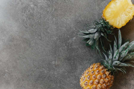Pineapple on a stone table. Tropical Fruits.の写真素材