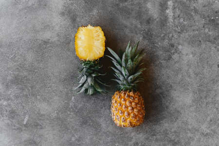Pineapple on a stone table. Tropical Fruits.の写真素材