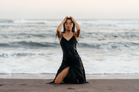 Smile Freedom and happiness chinese woman on beach.の写真素材