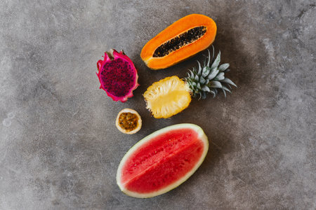 Fresh healthy tropical fruits, melon, pineapple, mango, dragon fruit.の写真素材