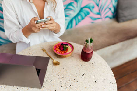 Pretty Young Beauty Woman Using Laptop in cafe, outdoor portrait business woman, hipster style,...
