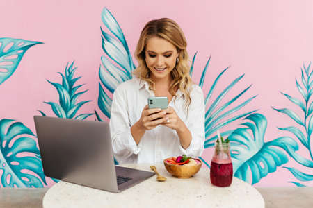 Pretty Young Beauty Woman Using Laptop in cafe, outdoor portrait business woman, hipster style, internet, smartphone, office,の写真素材