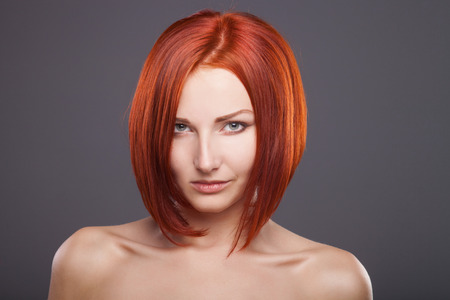 Red hair. Beautiful Woman with Short Hairの写真素材
