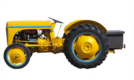 Vintage Yellow Tractor isolated with clipping path      の写真素材