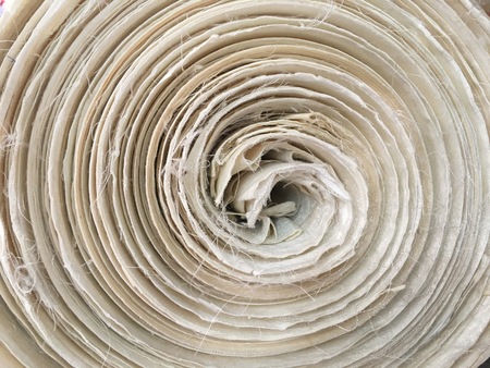 Close up of handmaiden textile canvas in the roll background.の写真素材
