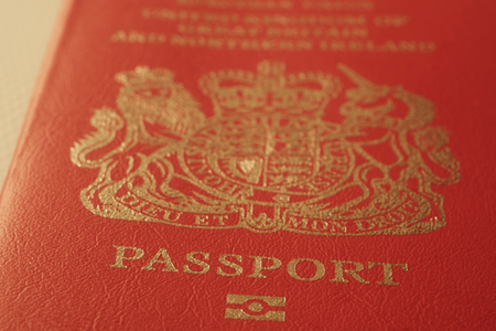 Britain passport cover toned blurred closeup background photoの写真素材