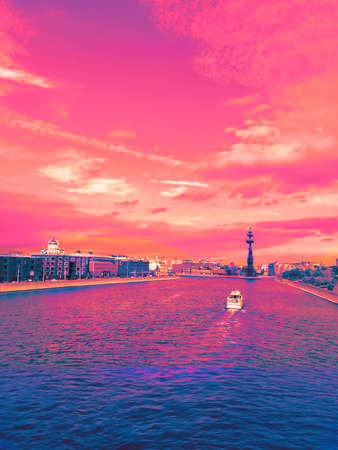 Skyline of Moscow, Russia. Moscow Tourist boat sails along the Moscow River and straight ahead the...