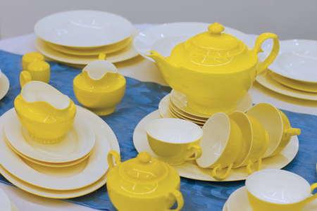 yellow table setting in  restaurantの写真素材