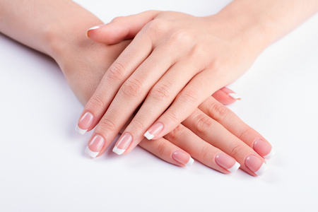 Female classic manicure. Beautiful well-groomed hands.の写真素材