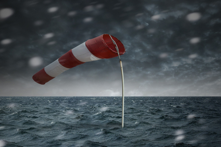 Windsock in the storm on the open seaの写真素材