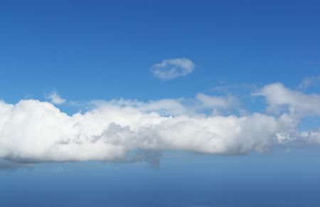 flight with the top of the clouds,の写真素材