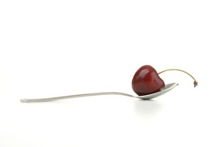 cherry on a spoonの写真素材