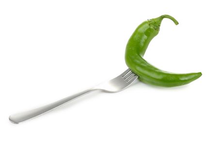 fork with green hot pepperの写真素材