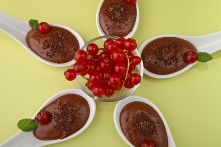spoon of chocolate mousse and currantの写真素材