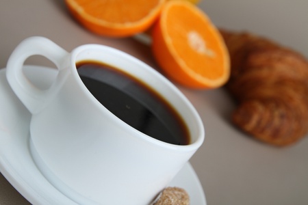 cup of black coffee and breakfastの写真素材