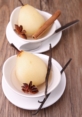 poached pear with vanilla and cinnamonの写真素材