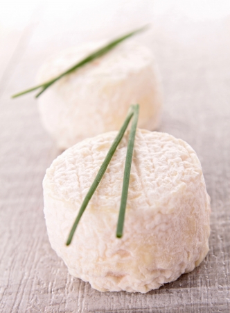 cheese on wooden backgroundの写真素材