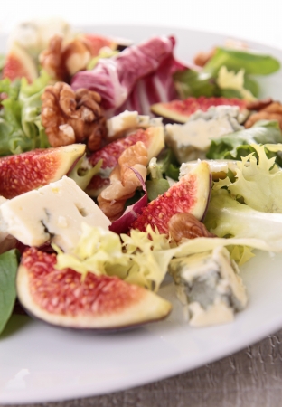 mixed salad with lettuce,fig,cheese and walnutの写真素材