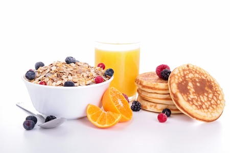 breakfast with muesli,berries and parncakes