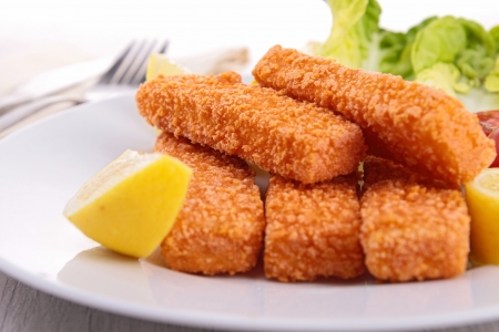 fish fingers with garnishの写真素材