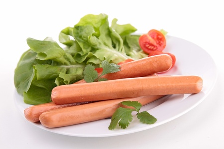 isolated plate of sausages and vegetablesの写真素材