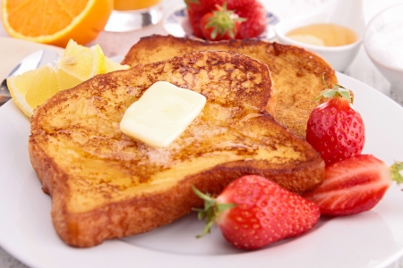 french toast with butter and honeyの写真素材