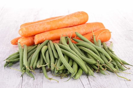 raw green beans and carrotの写真素材
