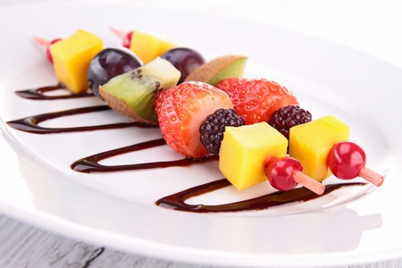 fruit skewer and chocolate sauceの写真素材