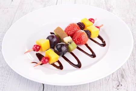 fruit skewer and chocolate sauceの写真素材