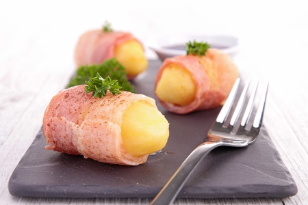 potato wrapped in baconの写真素材
