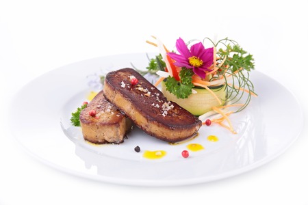 grilled foie gras with vegetables and flowersの写真素材