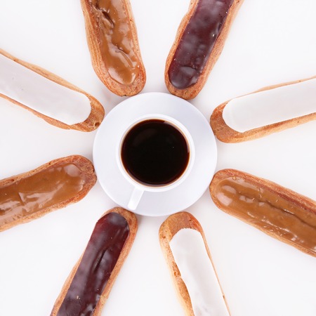 eclairs and coffee cup