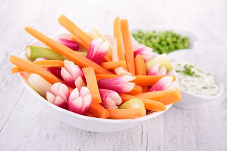 vegetables sticks on wooden table の写真素材
