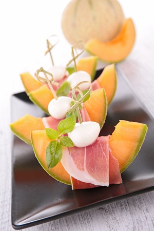 melon, prosciutto and mozzarellaの写真素材