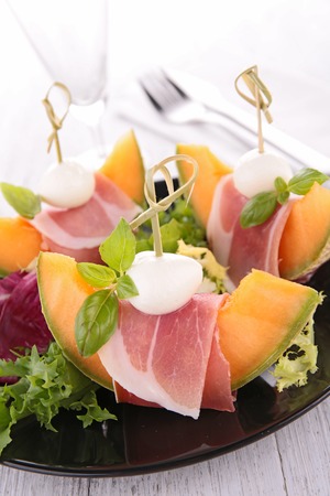 melon, prosciutto and mozzarellaの写真素材