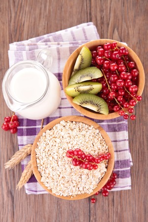 breakfast with cereal and fruitsの写真素材