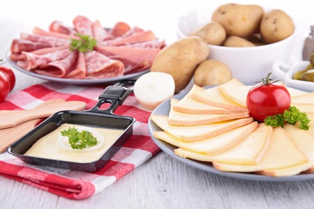raclette cheese and meatsの写真素材