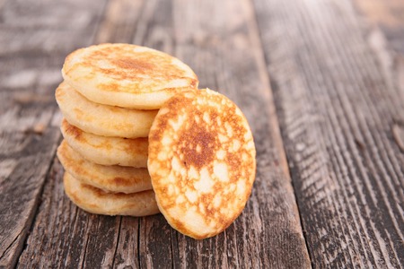 blinis on wooden table