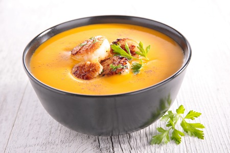 pumpkin soup and scallopの写真素材